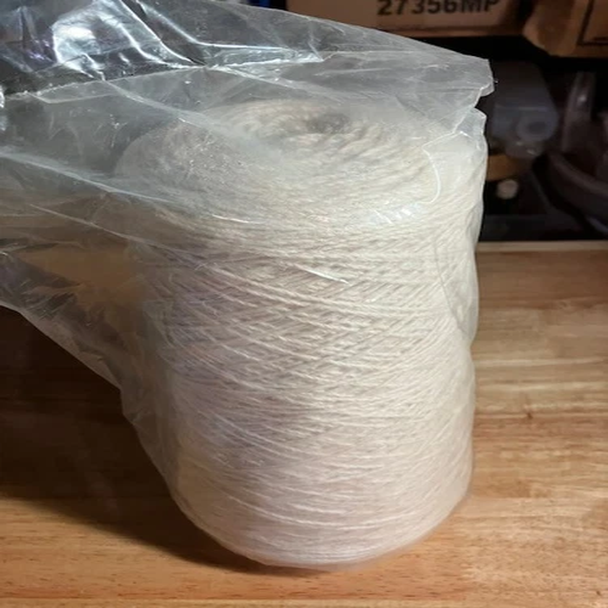 Large Spool of Ivory Colored Yarn