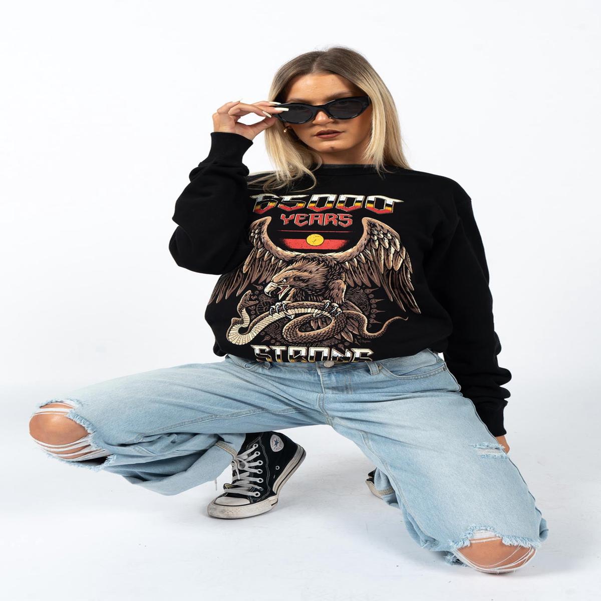 65,000 Years Strong Black Premium Cotton Crew Neck Unisex Sweatshirt