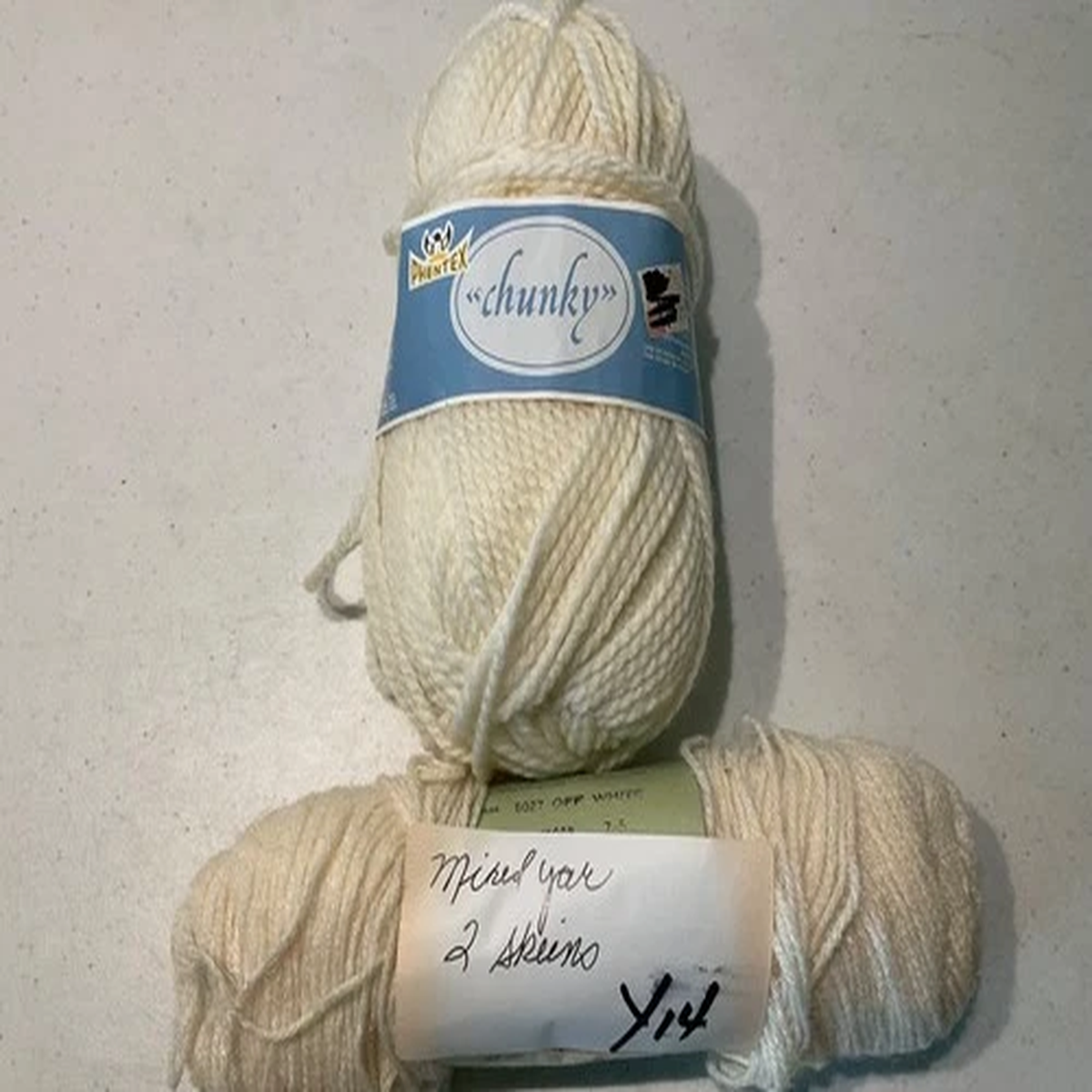 YARN 2 SKEINS OFF. WHITE IN COLOR Y14